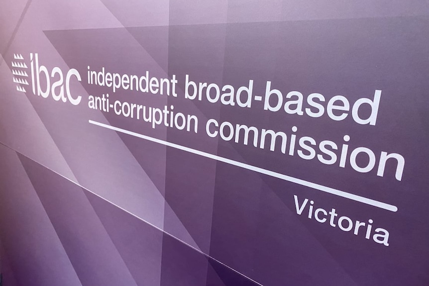 Close-up of signage spelling out the full IBAC name - Independent Broad-based Anti-corruption Commission.