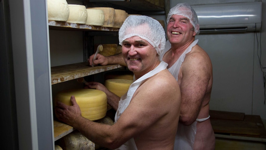 Paul and Kerry Wilson wear only hair nets and aprons.