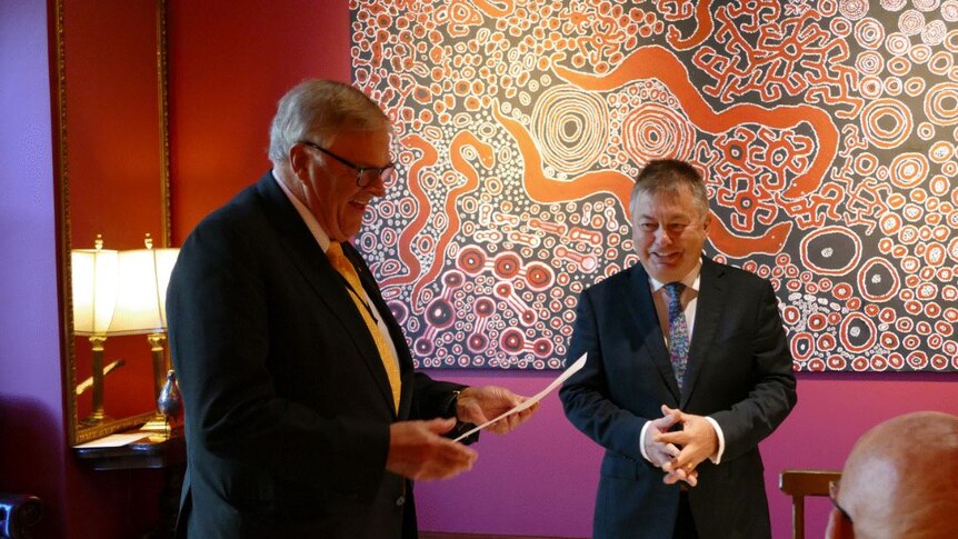 Sofronof and Kim Beazley shake hands during the judge's swearing in in WA