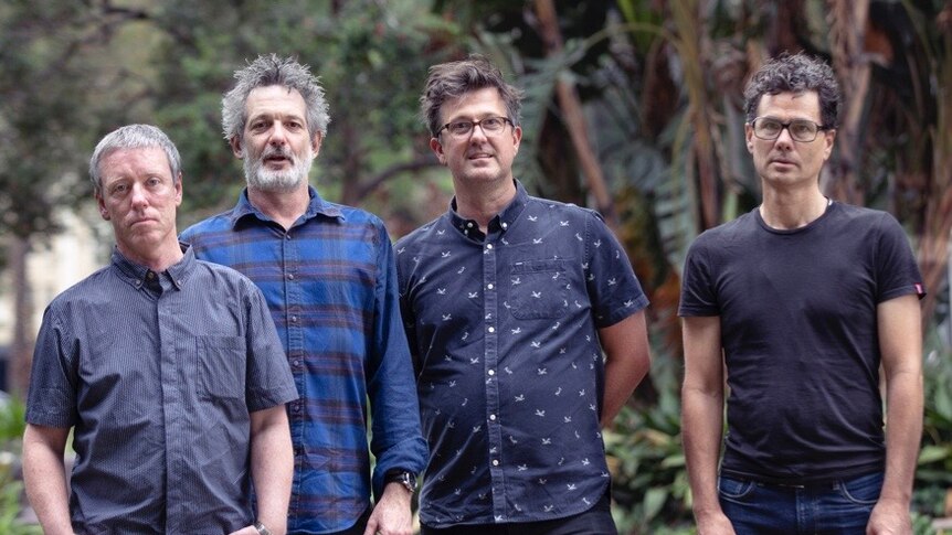 All four members of Australian band Custard