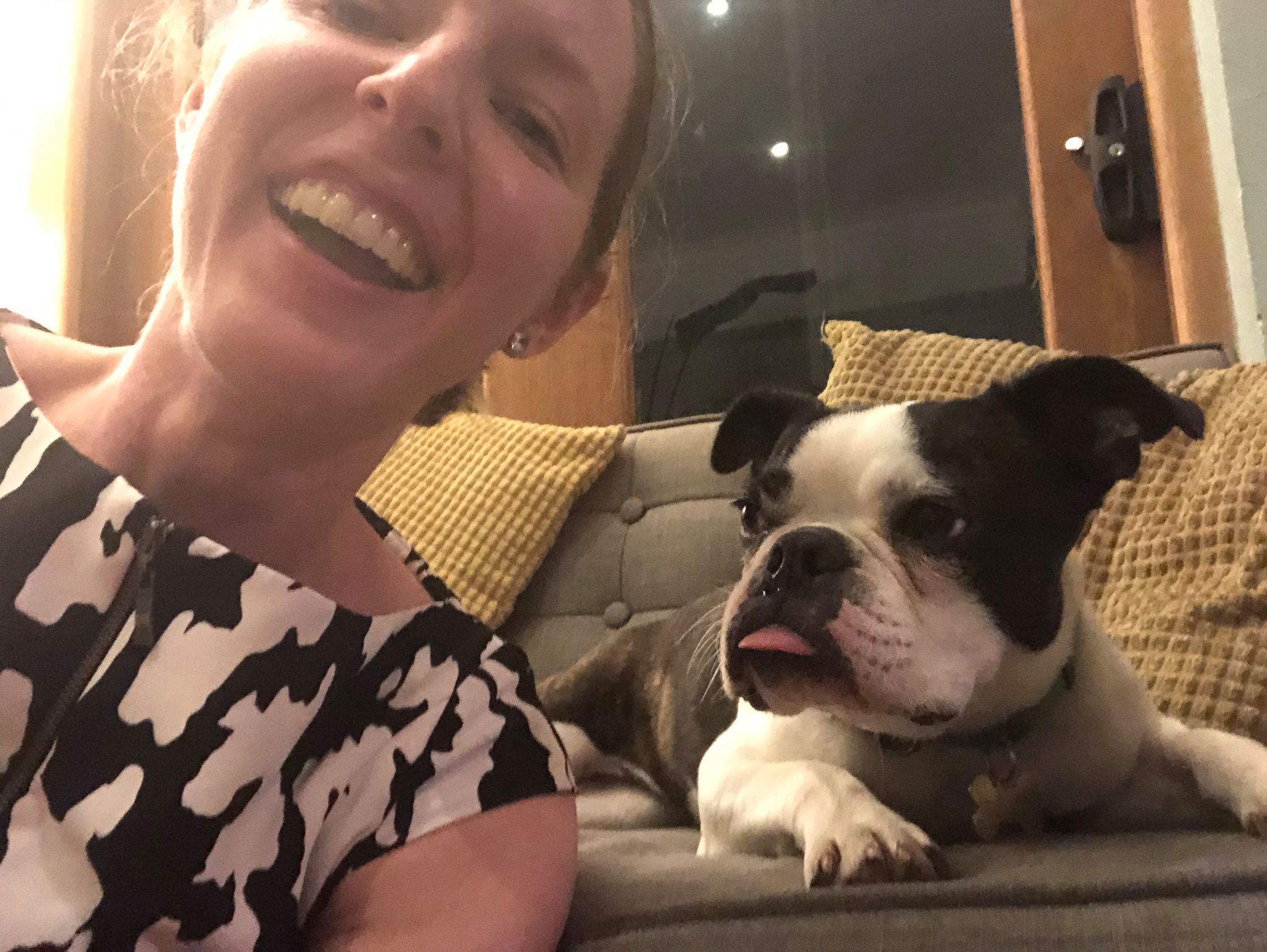 Kate Smith pictured smiling with a dog she looked after while pet sitting.