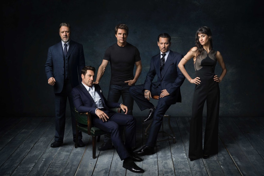 Actors Russell Crowe, Javier Bardem, Tom Cruise, Johnny Depp and Sofia Boutella stand in a promotional shot for Dark Universe.