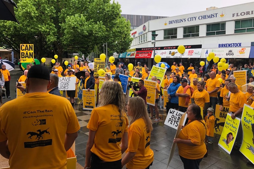 Dozens of protestors rally in Canberra against a proposed ban on greyhound racing in the ACT.