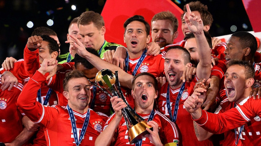 Winners are grinners ... Bayern Munich celebrates its victory