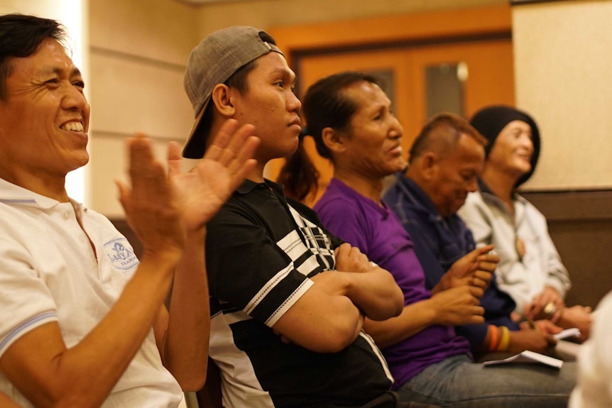 Waria in the audience of a special weekly church service.