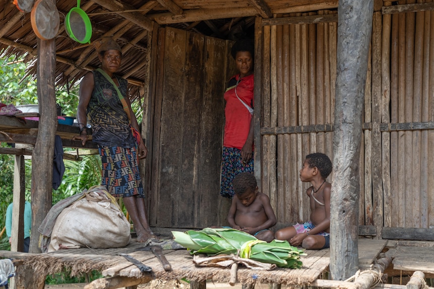 A family in their home in the Yellow River.