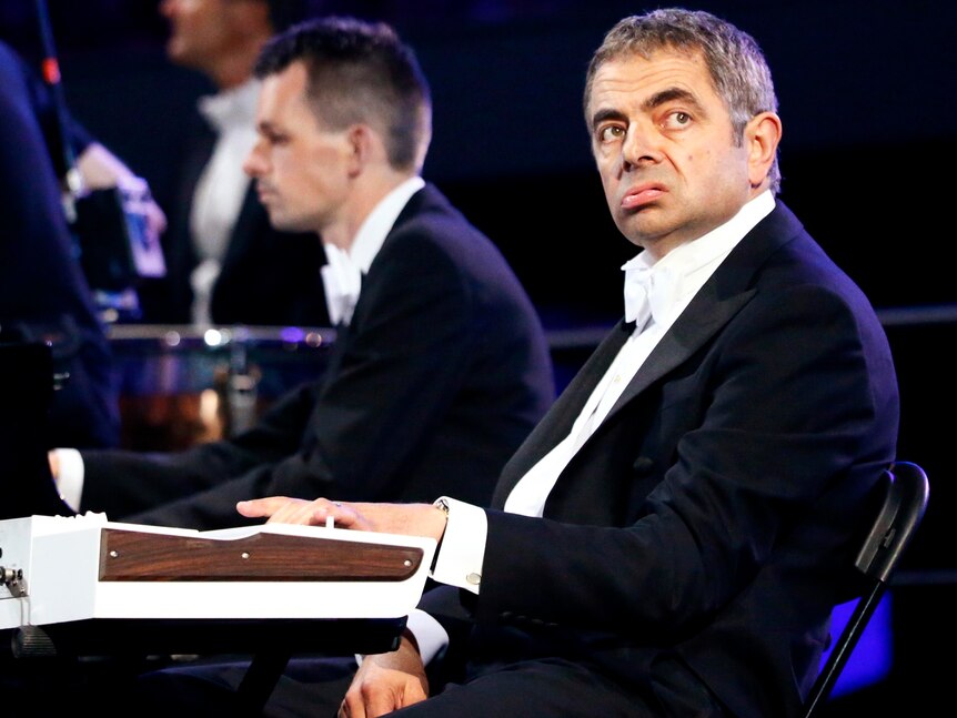 Actor Rowan Atkinson, playing Mr Bean, performs during the opening ceremony.