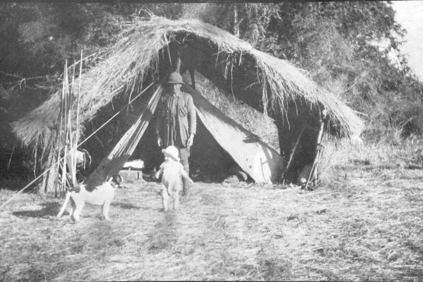 Walter Brockway stands behind his son, Hugh, in British East Africa.