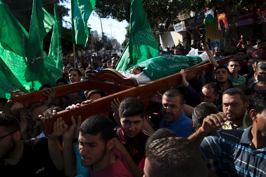 A funeral procession of a young man is seen.