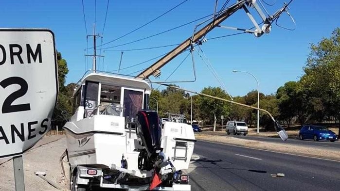 A boat and trailer which crashed into a stobie pole at Walkley Heights and caused extensive damage.