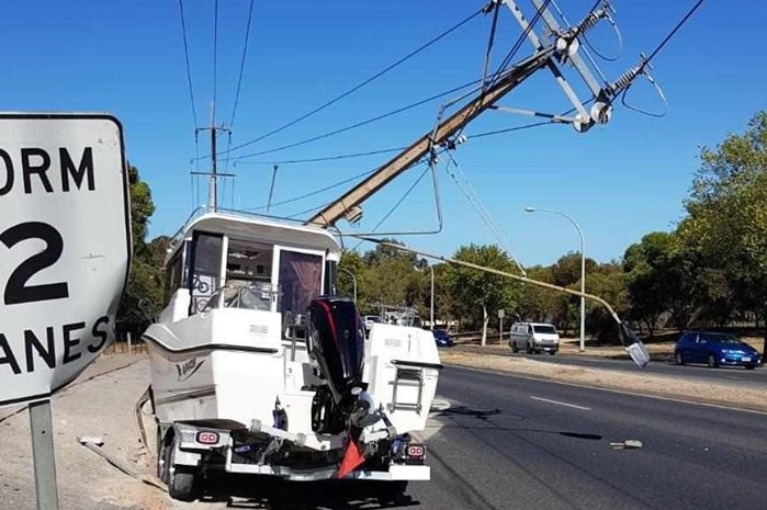 A boat and trailer which crashed into a stobie pole at Walkley Heights and caused extensive damage.