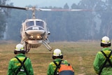 Bushfire crews fly into Harrietville