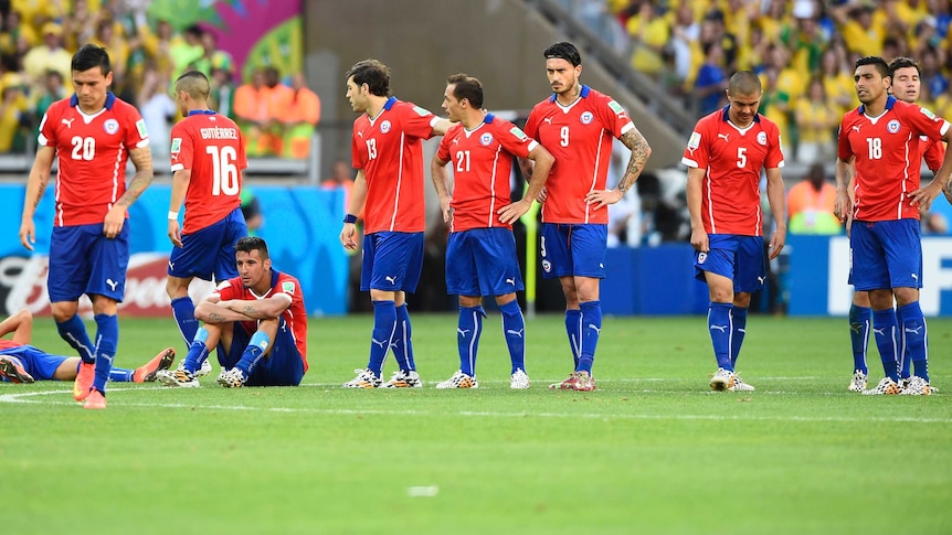 Chile players look on after shootout loss to Brazil