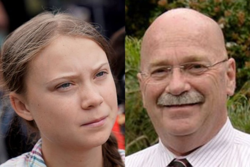 A photo of a young girl next to an old man.