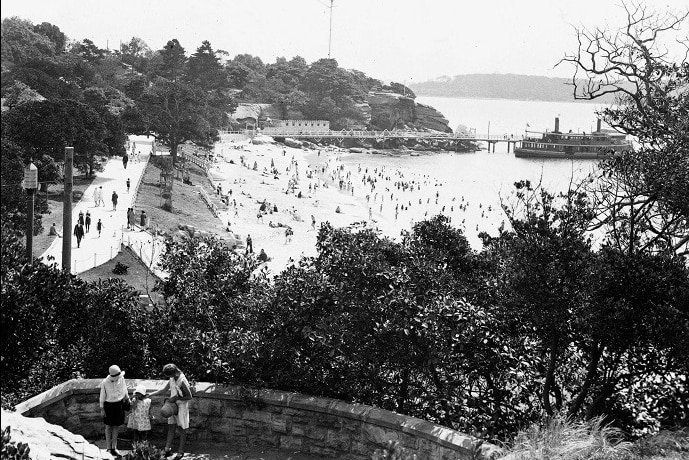 a black and white image from 1929 shows nielsen park and the harbour beach