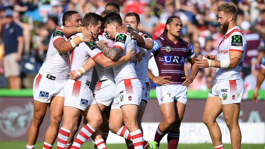 St George Illawarra Dragons celebrate against Manly
