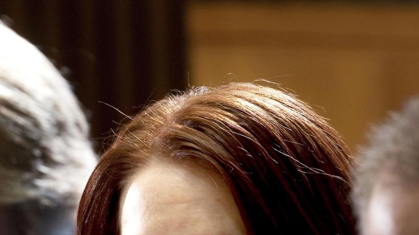 LtoR Anna Bligh, Kristina Keneally and Julia Gillard listen after the COAG meeting