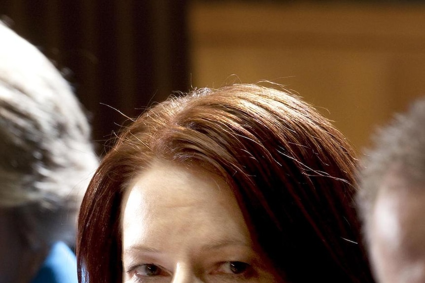 LtoR Anna Bligh, Kristina Keneally and Julia Gillard listen after the COAG meeting