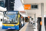 Bus parked at Platform 2 at Roma Street Station busway in Brisbane's CBD in May 2019.
