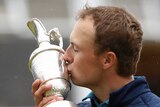 Jordan Spieth kisses the Claret Jug after winning the British Open