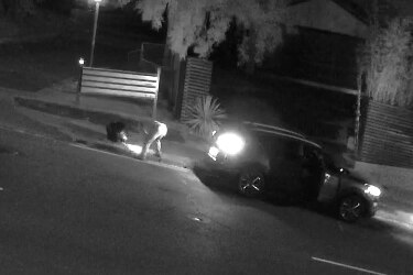 A man and a car in a CCTV film