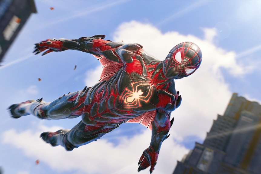 Spider-man glides to the ground.