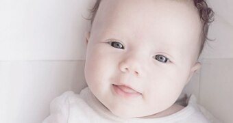 A baby's face on a white background
