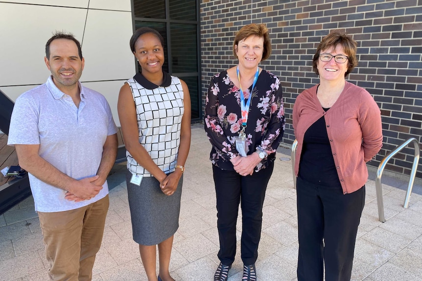 Staff at Murray Bridge standing outside the hospital posing for a photo