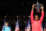 Rafael Nadal holds aloft the US Open trophy