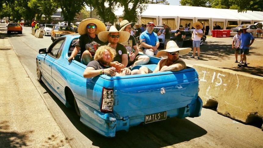 A group of men in the back of a ute during Summernats 29 in Canberra.