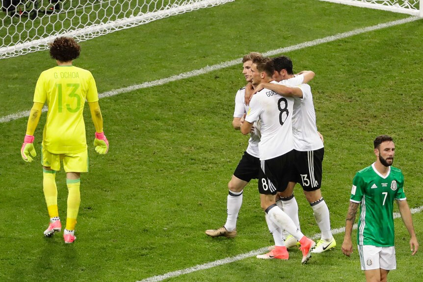 Germany's Timo Werner, (2L), celebrates his Confederations Cup semi-final goal against Mexico.