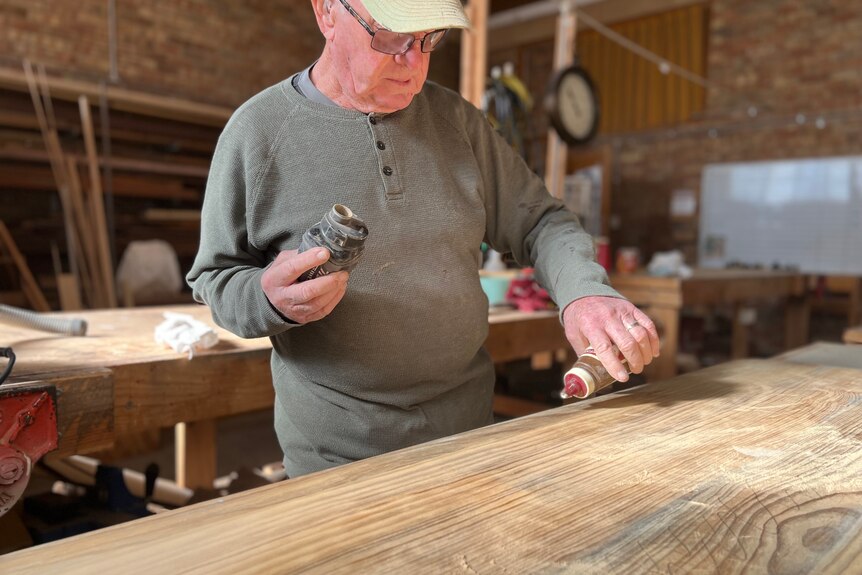 a man at work in a men's shed