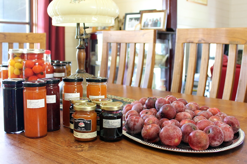 Plums from Roxanne Hopkins' orchard and a display of her jams.