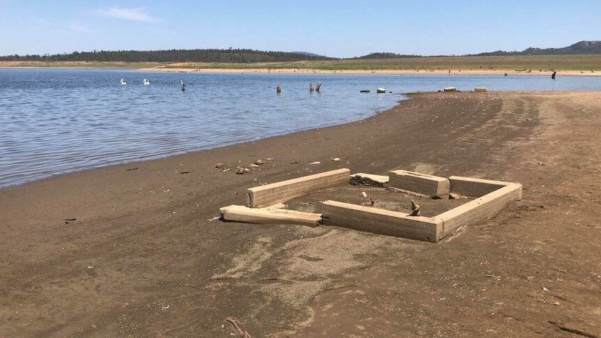 Former grave sites exposed beside a large dam near Gunnedah, NSW.