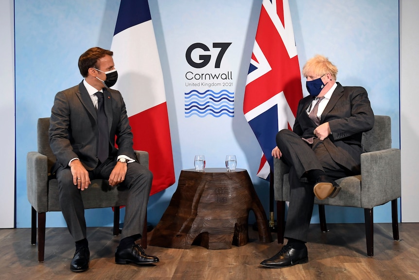 Britain's Prime Minister Boris Johnson, right, and French President Emmanuel Macron.