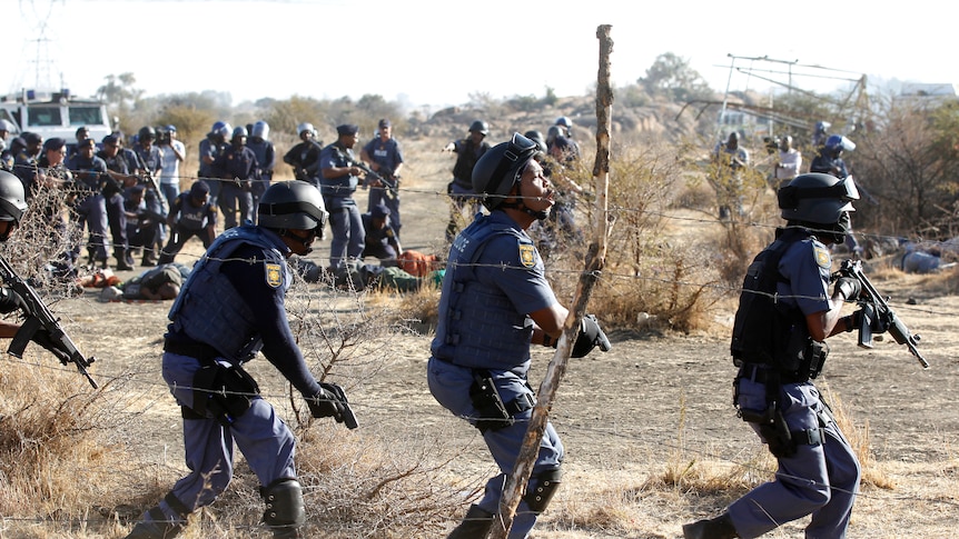 Police react after firing at protesting miners in South Africa