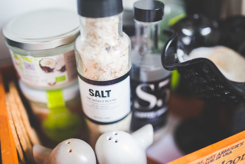 Salt and other seasoning sits in a tray
