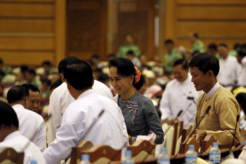 Aung San Suu Kyi arrives for Myanmar's first parliament meeting after general elections