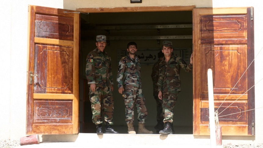 An Afghan Army officer and cadets at the Afghanistan National Army Officer Academy on the outskirts of Kabul.