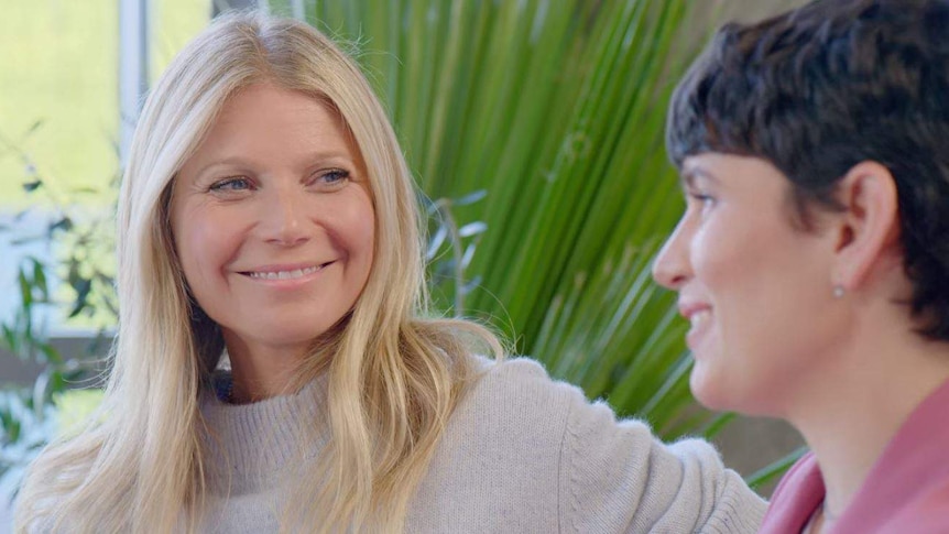 Gwyneth Paltrow and Elise Loehnen mid-conversation during episode one of The Goop Lab.