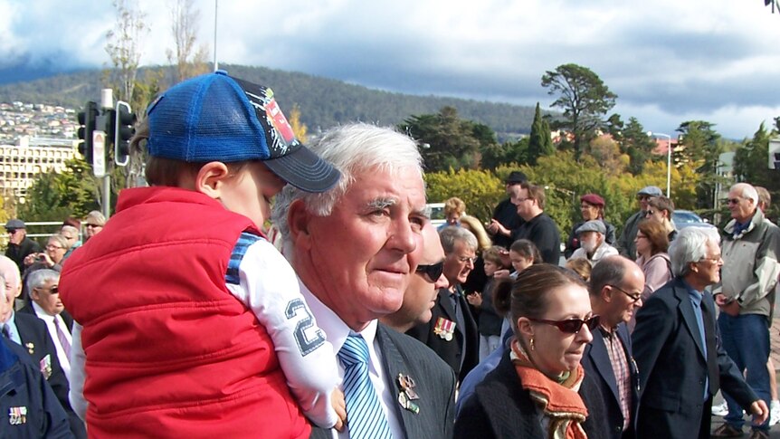 Families unite during the Hobart ANZAC day march