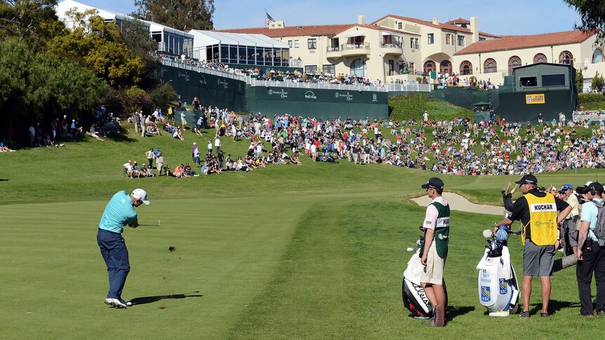 Bill Haas hits his second shot on the 18th during the third round at Riviera Country Club.