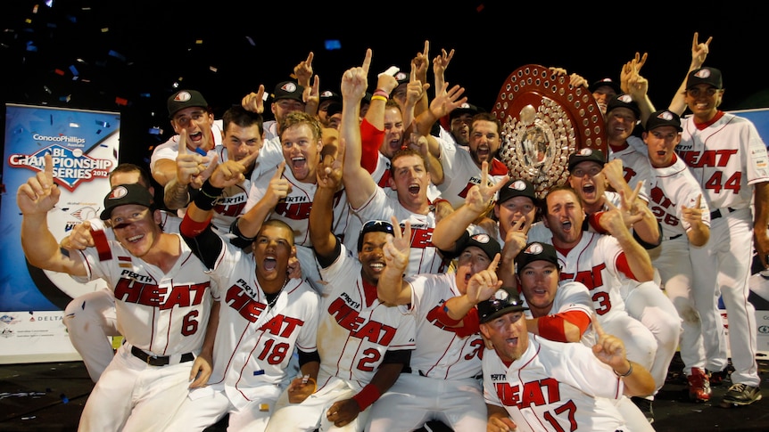 Bringing the Heat ... Perth players celebrate their second consecutive Claxton Shield.