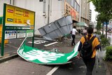 Collapsed steel advertising boards caused by Typhoon Faxai are seen at Edogawa ward in Tokyo.