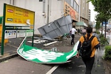 Collapsed steel advertising boards caused by Typhoon Faxai are seen at Edogawa ward in Tokyo.