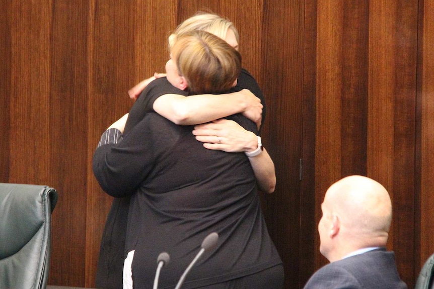 Labor Leader Rebecca White (L) hugs Lara Giddings on her last day in Tasmanian Parliament.