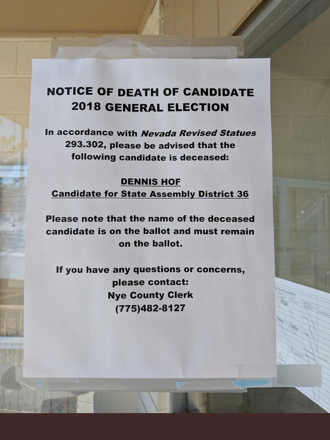 A piece of paper with a notice about a dead candidate