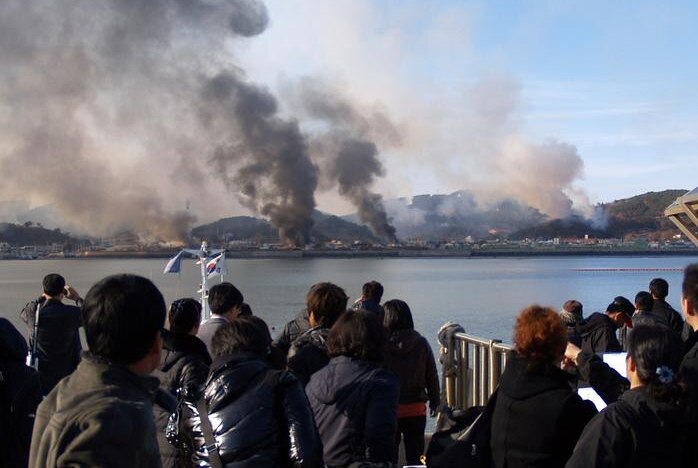 Smoke rises after Korean artillery strikes (AFP)