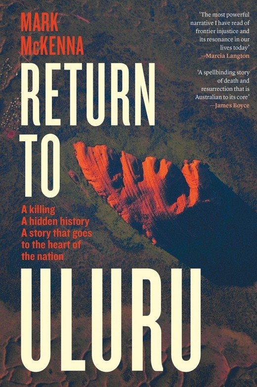 A book cover shows a grainy-looking aerial shot of Uluru.