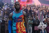 a still from the movie space jam a new legacy that shows lebron james and bugs bunny looking surprised